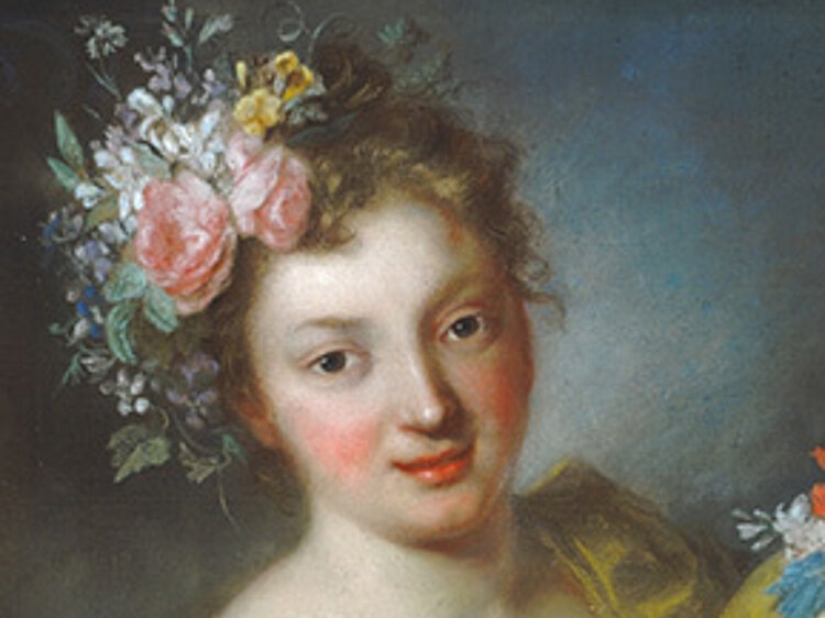 Frau mit Blumen im Haar